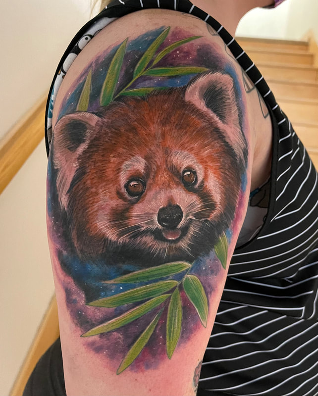 Realistic color tattoo of a red panda with a background of galaxy space.