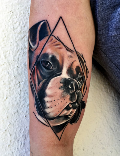 Color realism tattoo of a boxer dog with a diamond frame.